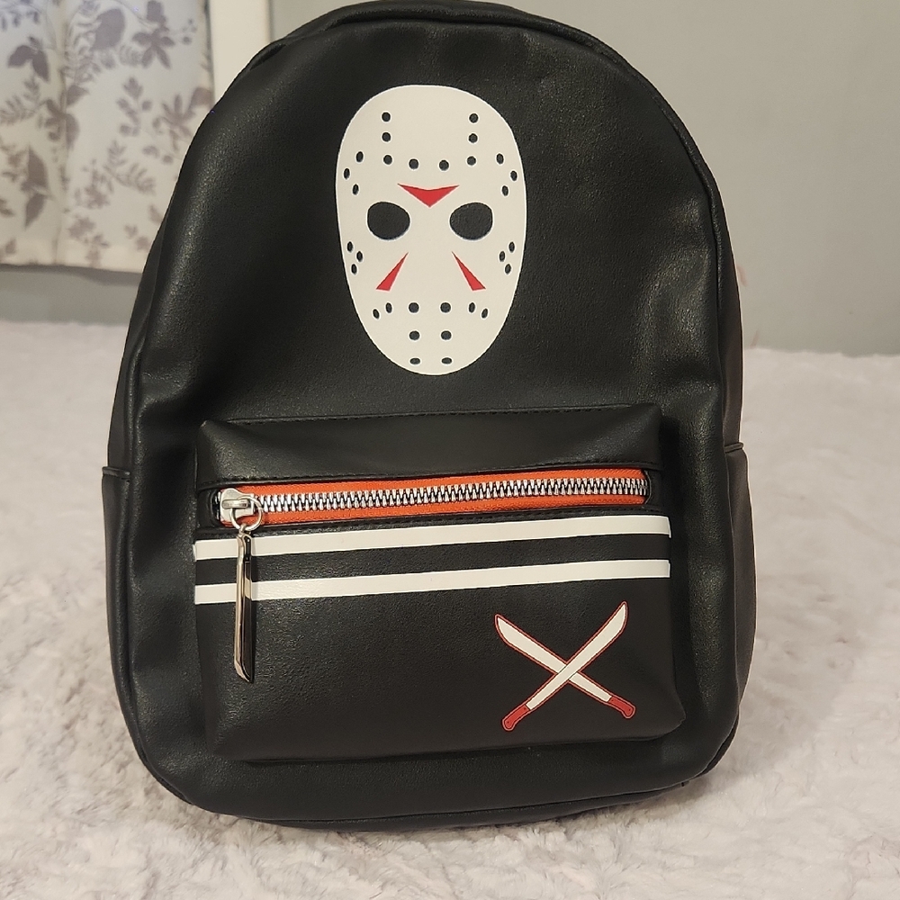 Stylish Black Backpack with Hockey Mask Design